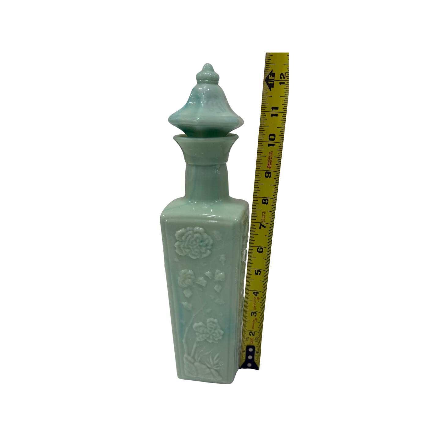 1972 liqour bottle, blue